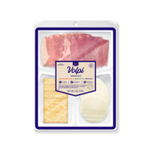 creamy provolone cheese with crackers and savory prosciutto